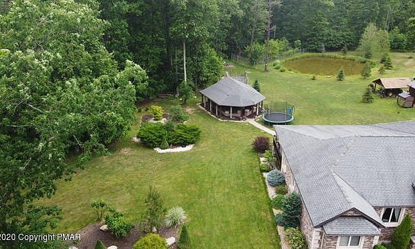 Large Pocono Cabin Rentals. The Mansion is a large private Pocono cabin rental with sauna, hot tubs, private pond and more! Great rental for groups and families. Call or text with questions or to make a reservation: 215-803-5323